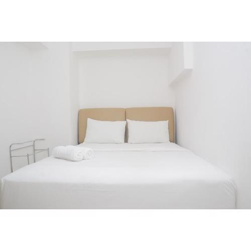 Minimalist and Stylish 1BR Bassura City Apartment By Travelio