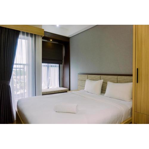 Minimalist and Warm Studio at Transpark Bintaro Apartment By Travelio