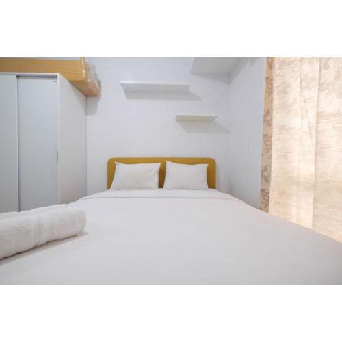 Minimalist Studio at Azalea Suites Cikarang Apartment By Travelio