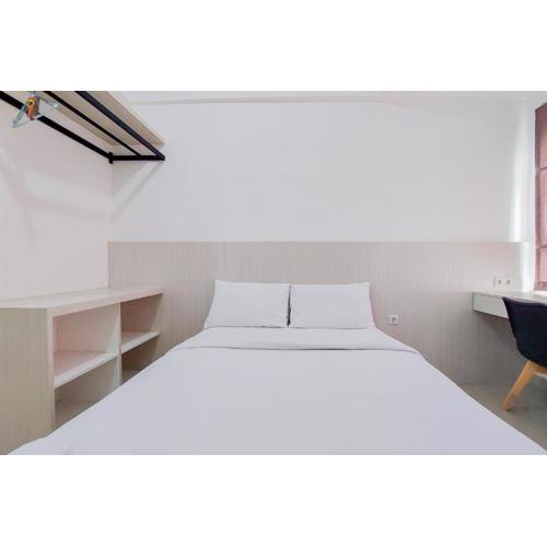 Minimalist Studio at Poris 88 Apartment By Travelio