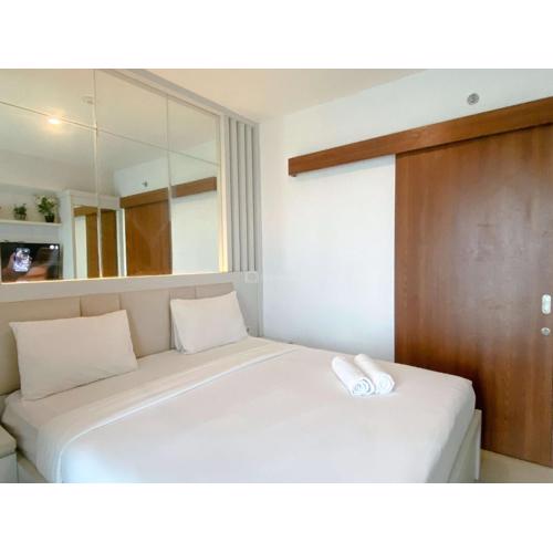 Minimalist Studio Grand Kamala Lagoon Apartment By Travelio