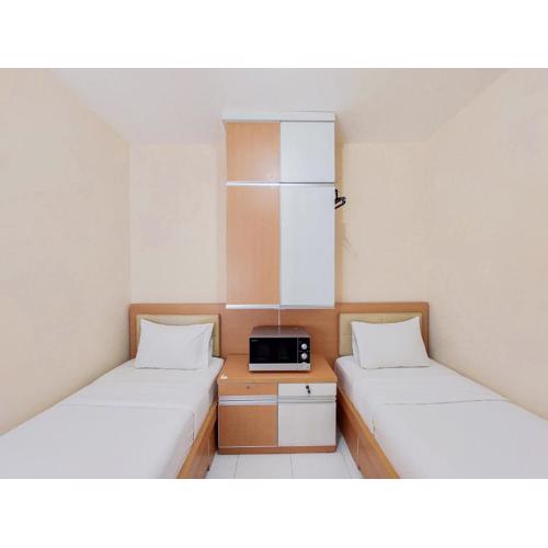 Minimalist Studio Room Apartment at Aeropolis Residence By Travelio