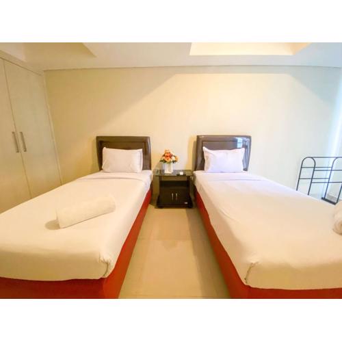 Minimalist Studio Room Marquis de Lafayette Apartment By Travelio