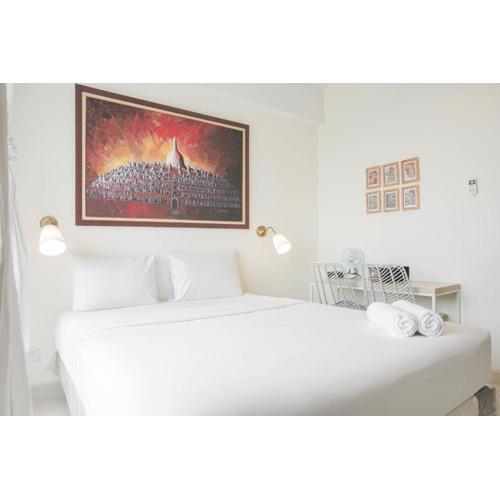 Minimalist Studio Room with City View at West Vista Apartment By Travelio