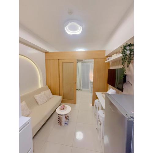 MOA Shell Residences Tower B 1BR with pullout bed and sofabed balcony pool view