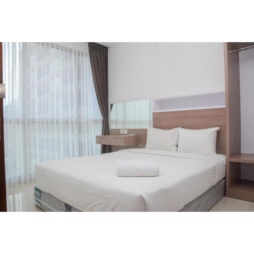 Modern 1BR at Ciputra World 2 Apartment By Travelio