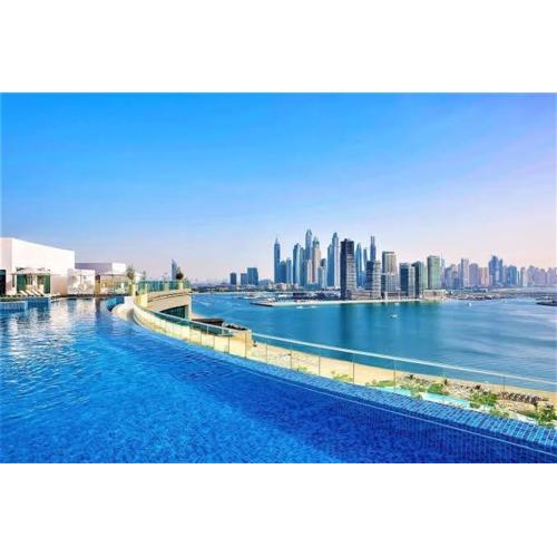 Modern 1BR Seven Palm Private Beach Infinity Pool