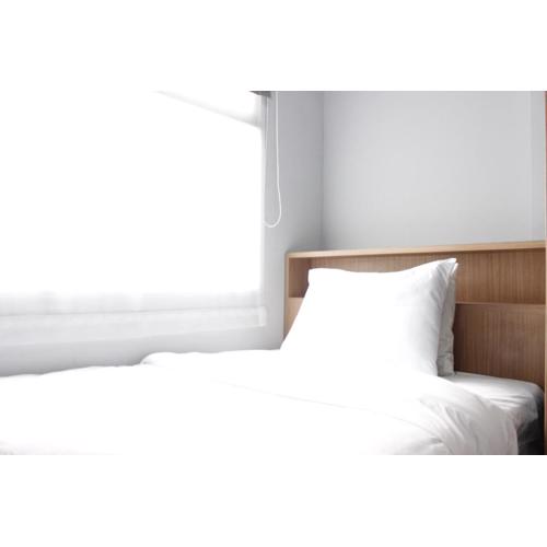 Modern 2BR Apartment at Grand Asia Afrika Residence By Travelio