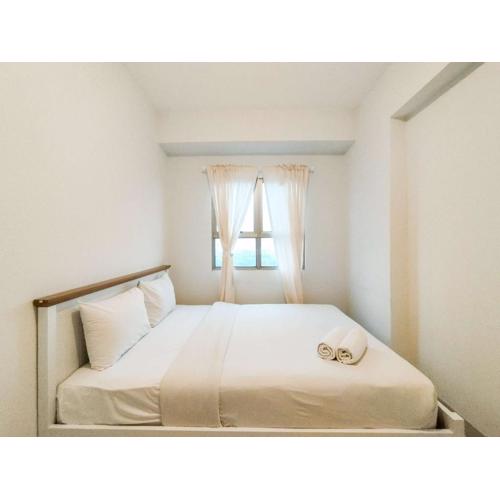 Modern 2BR at Mekarwangi Square Cibaduyut Apartment By Travelio