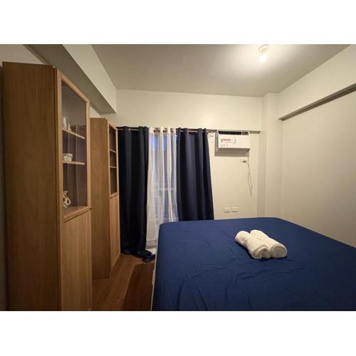 Modern 2BR Condo with Balcony in Central Manila