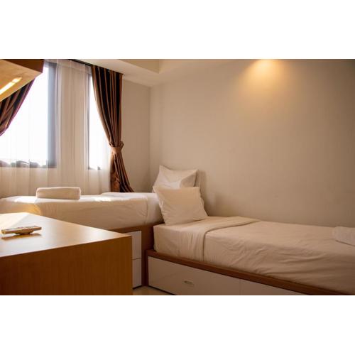 Modern and Classic 1BR at Evenciio Margonda Apartment By Travelio