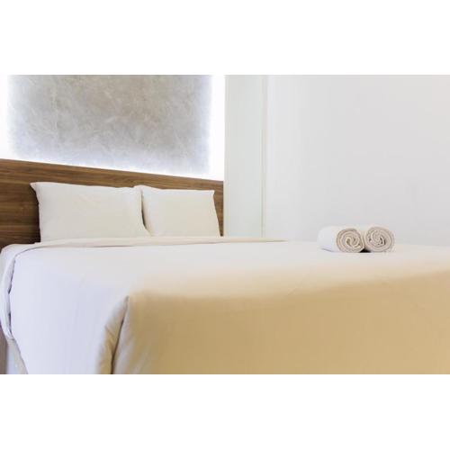 Modern and Clean 2BR Apartment at M-Town Residence By Travelio