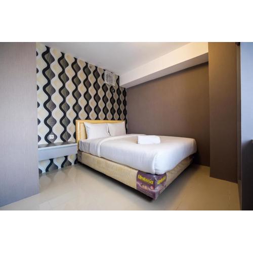 Modern and Comfort 2BR Bassura City Apartment By Travelio