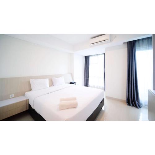 Modern and Comfy Studio at Grand Sungkono Lagoon Apartment By Travelio