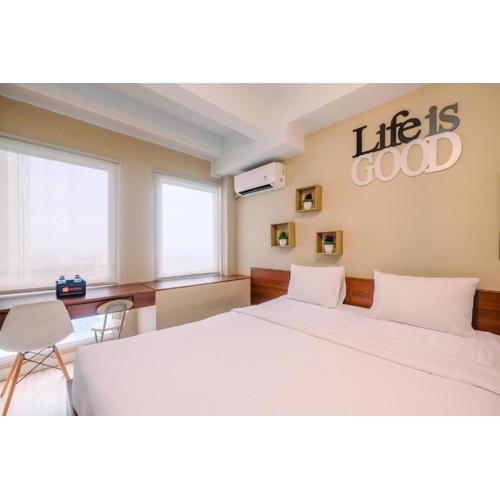 Modern and Compact Studio at Patraland Urbano Apartment By Travelio