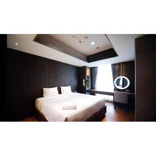 Modern and Cozy 2BR at Grand Sungkono Lagoon Apartment By Travelio