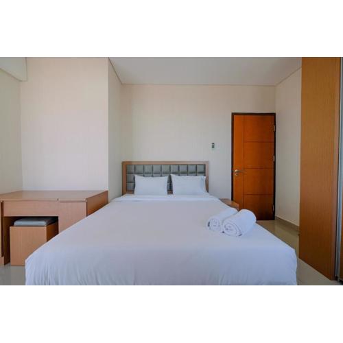 Modern and Cozy 2BR Royal Olive Apartment By Travelio