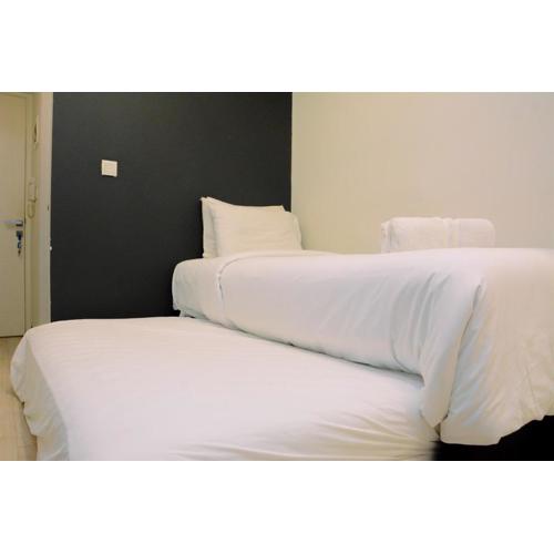 Modern and Full Parquette Studio Springlake Summarecon Bekasi Apartment By Travelio