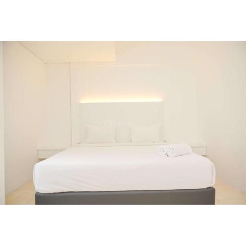 Modern and Homey 2BR at MT Haryono Square Apartment By Travelio