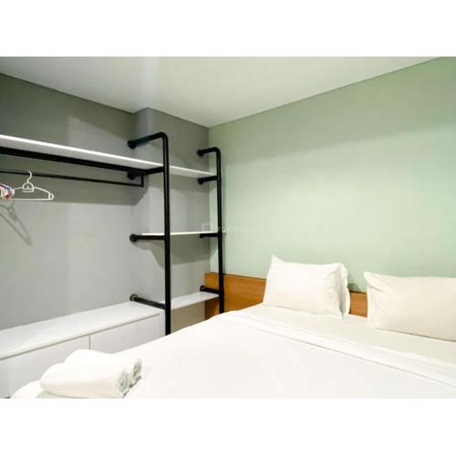 Modern and Nice 2BR at Patraland Urbano Apartment By Travelio