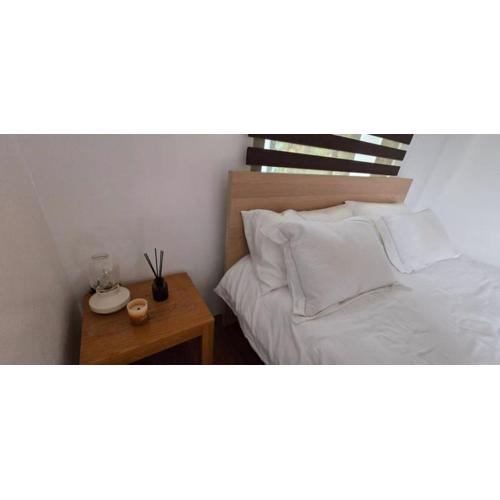 Modern chalet type building set in quite garden area