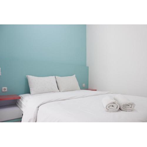 Modern Chic 2BR Apartment Parahyangan Residence near UNPAR By Travelio