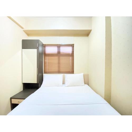 Modern Designed 2BR at Suites @Metro Apartment By Travelio