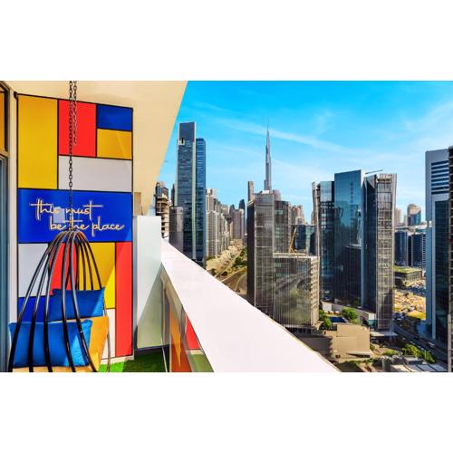 Modern High-Floor Apartment with Burj Khalifa View by Dejaview Stays