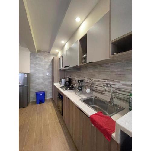 modern living apartment with heated swimming pool ample parking space, fully equipped gym and a relaxing rooftop with amazing city views