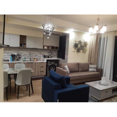 modern living two bedroom apartment with heated swimming pool well equipped gym ample parking space children playing ground and a relaxing rooftop with breathtaking scenic views