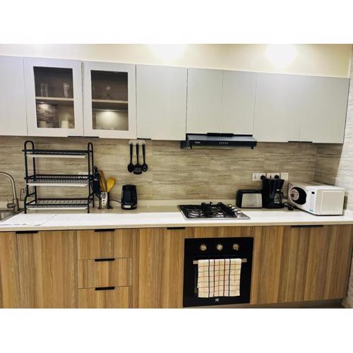 modern living two bedroom apartment with heated swimming pool well equipped gym ample parking space children playing ground and a relaxing rooftop with breathtaking scenic views