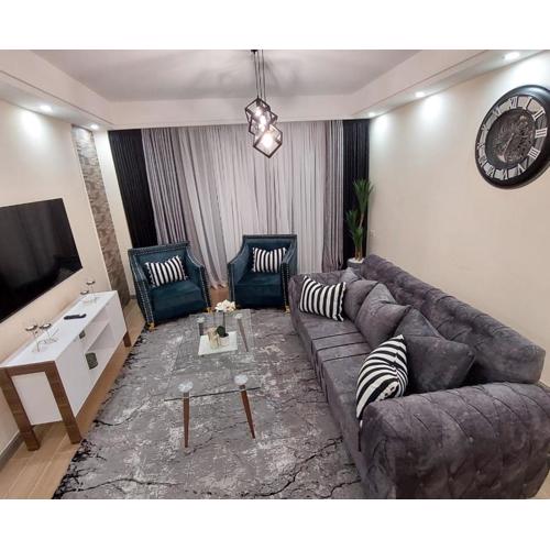 modern living two bedroom apartment with heated swimming pool well equipped gym ample parking space children playing ground and a relaxing rooftop with breathtaking scenic views