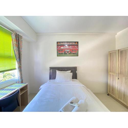 Modern Look 1BR Apartment at Parahyangan Residence near UNPAR By Travelio