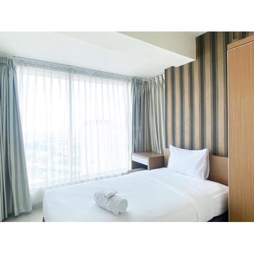 Modern Look 2BR at Grand Kamala Lagoon Apartment By Travelio