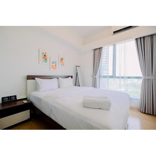 Modern Look 2BR at Sky House BSD Apartment By Travelio