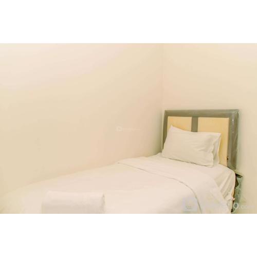 Modern Look 2BR Green Pramuka City Apartment near Mall By Travelio