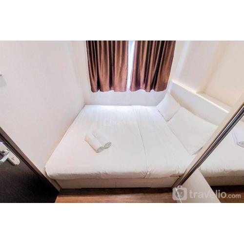 Modern Look and Comfortable 2BR Serpong Greenview Apartment By Travelio