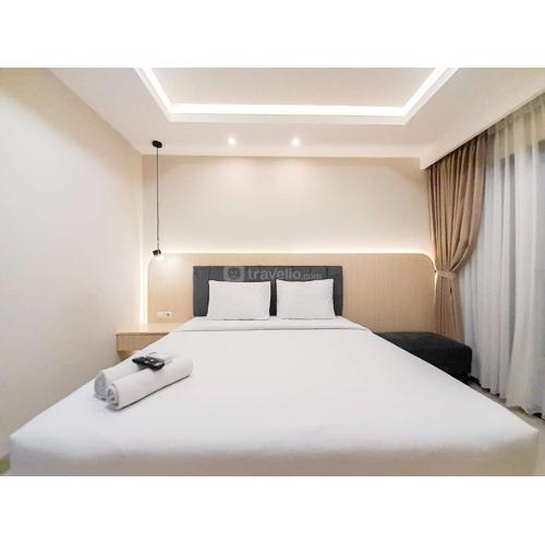 Modern Look and Comfortable Studio at Patraland Amarta Apartment By Travelio