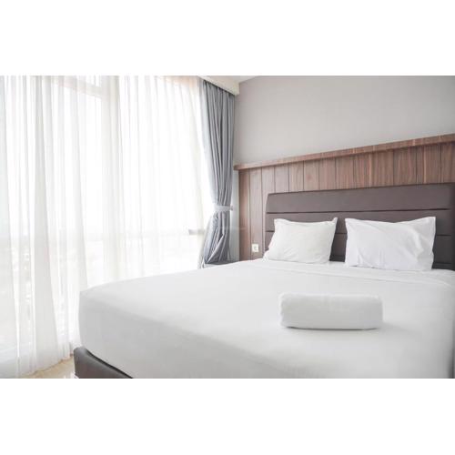 Modern Look and Comfy 2BR Menteng Park Apartment By Travelio