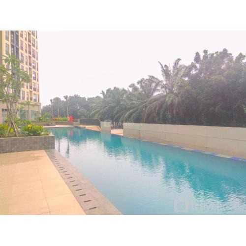 Modern Look and Homey 2BR Transpark Cibubur Apartment near Mall By Travelio