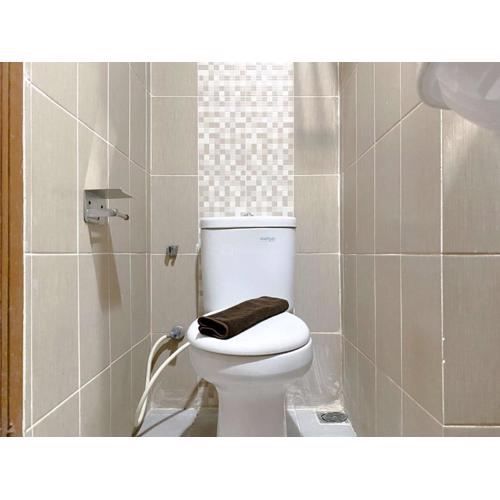 Modern Look and Homey Studio at Enviro Apartment By Travelio