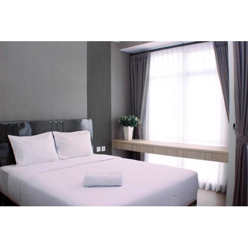 Modern Look and Restful Studio at 32th Floor Vasanta Innopark Apartment By Travelio