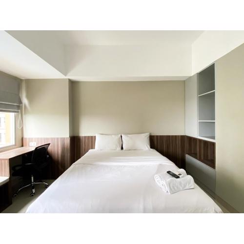 Modern Look and Tidy Studio Gateway Park LRT City Jatibening Apartment By Travelio