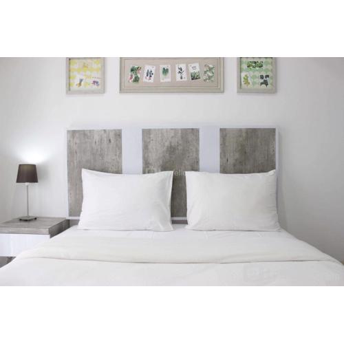 Modern Look Studio Apartment at Grand Asia Afrika By Travelio