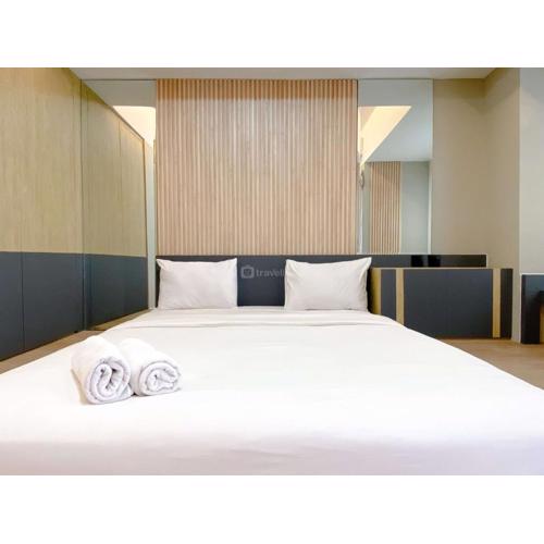 Modern Look Studio at Gateway Park LRT City Jatibening Apartment By Travelio