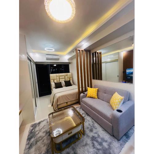 Modern Makati Condo with Balcony & Cityscape Views