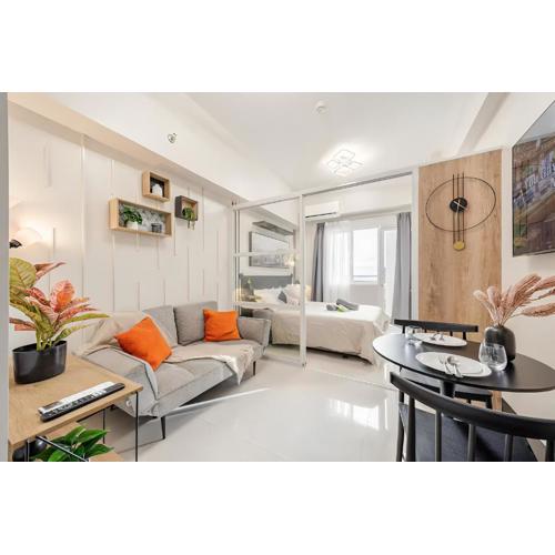 Modern Minimalist Studio with Balcony & Sunset View