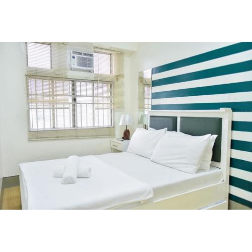 Modern Spacious 2BR Condo with Wifi at Aurora Gardens San Juan City near Rob Magnolia