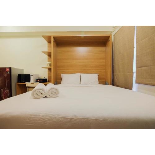 Modern Studio Apartment at 27th Floor Green Pramuka City By Travelio
