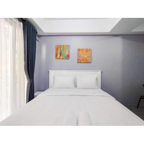 Modern Studio Room Apartment at Grand Asia Afrika By Travelio